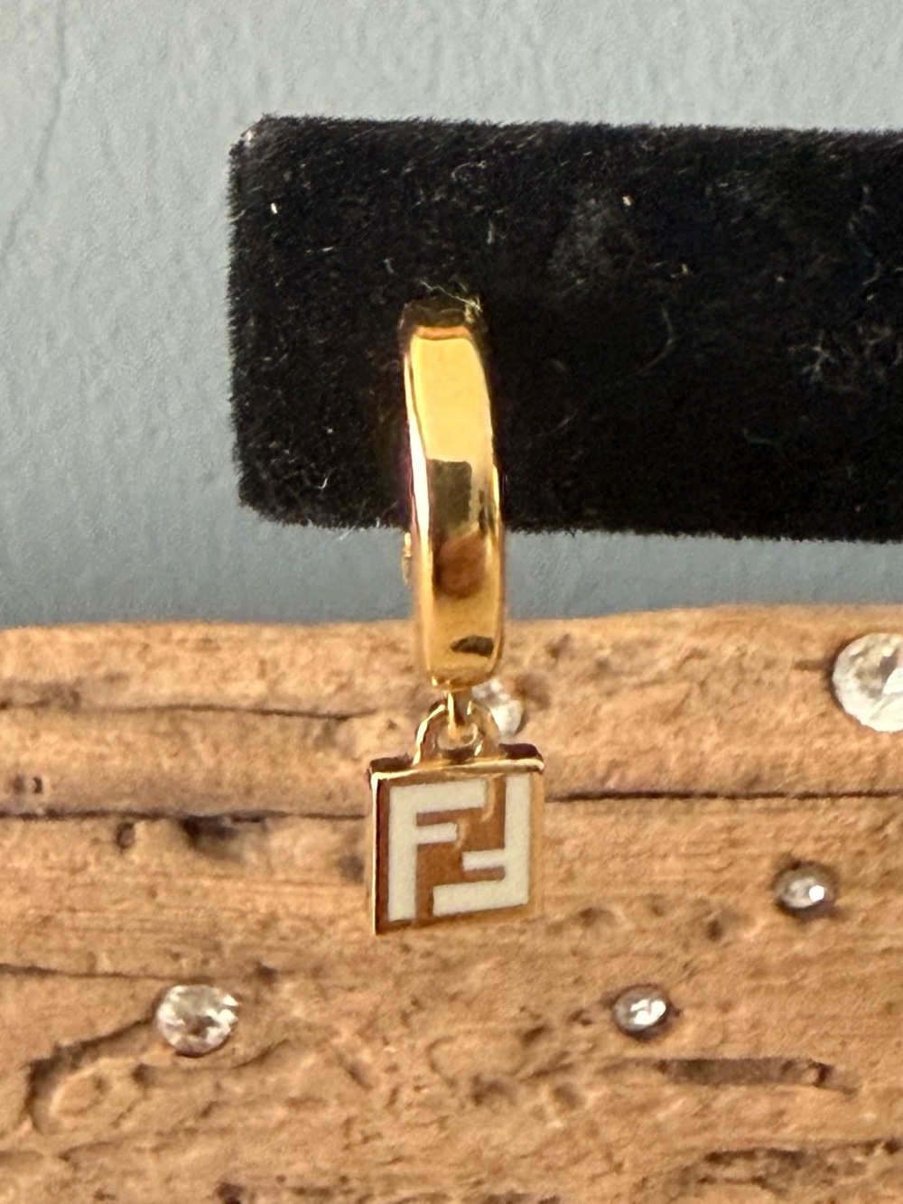 Fendi Gold-Tone Huggie Hoop Earring with White Enamel Logo Charm